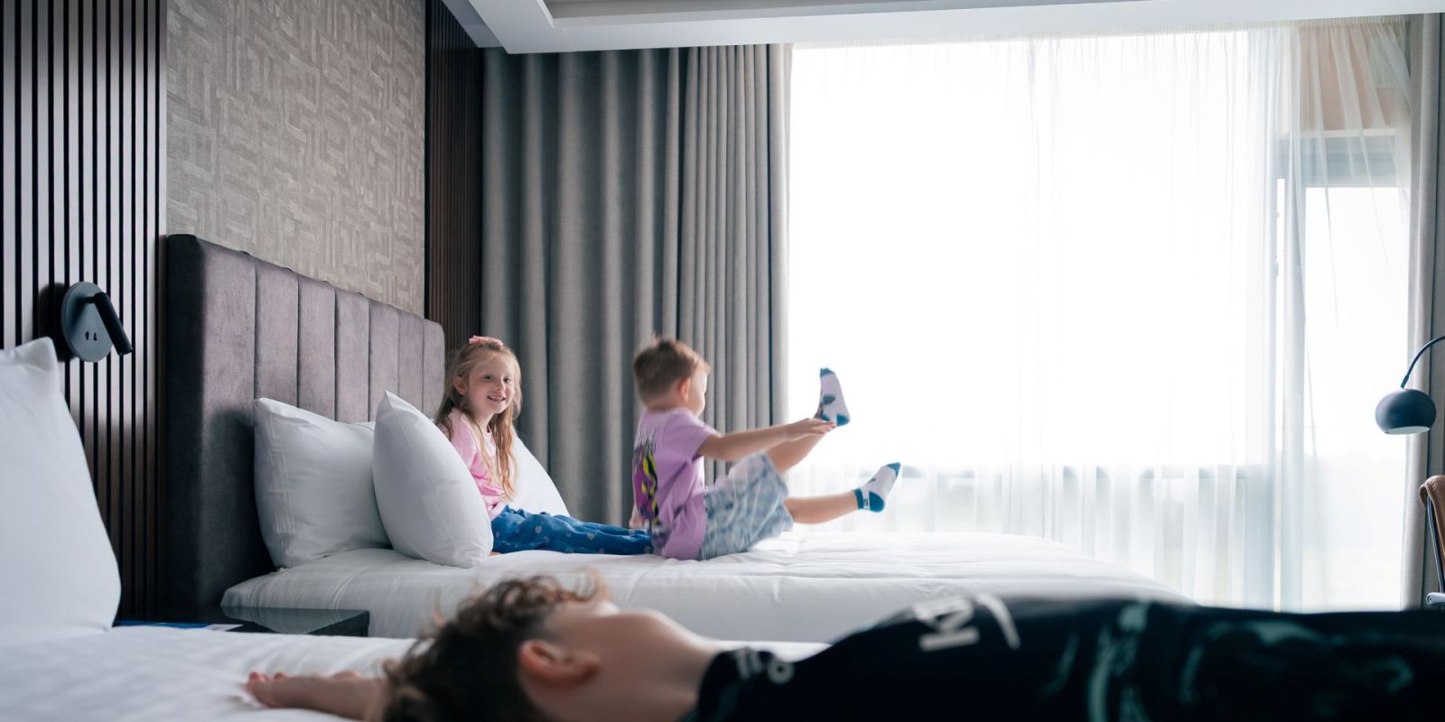 Children on pillo hotel beds www.pillohotelashbourne.com